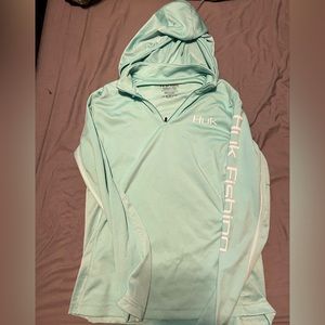 Women’s Huk Preformance Fishing long-sleeve shirt.